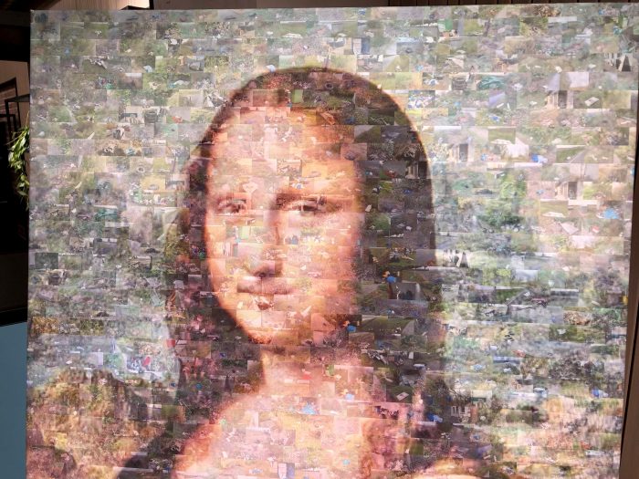 Mosaikbild der Mona Lisa, bestehend aus vielen kleinen Bildern, die das Hauptmotiv bilden.
