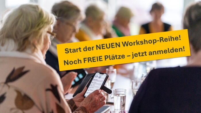 Gruppe von Menschen, die an einem Workshop teilnehmen und Smartphones verwenden.